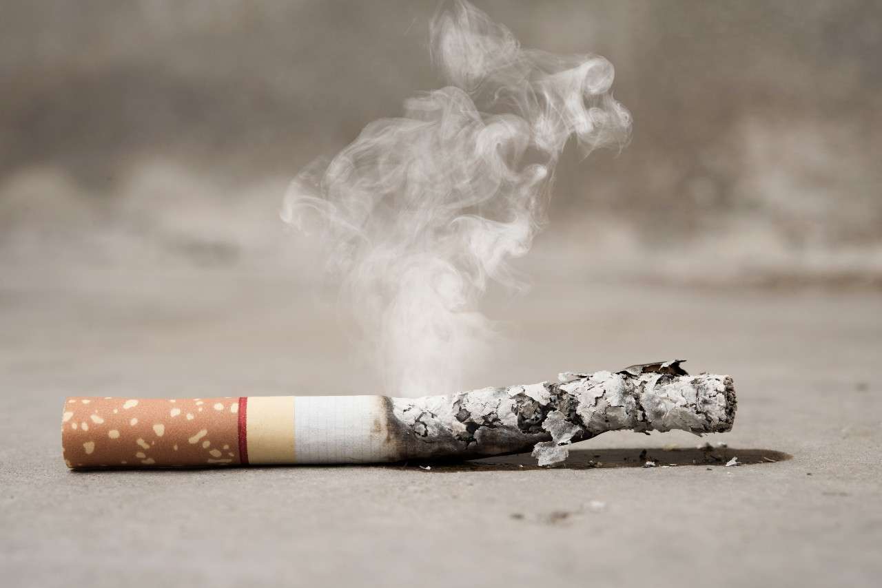 close-up-cigarette-burning-concrete-floor-stop-quitting-tobacco-concept (1)
