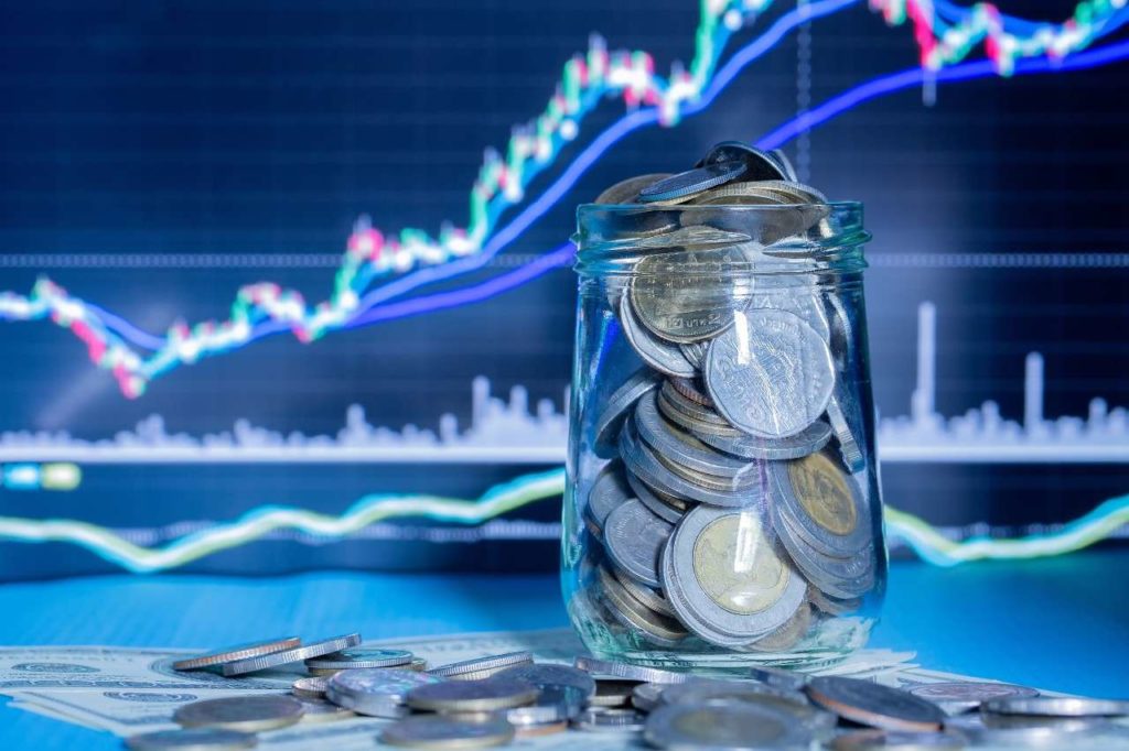 coins-bottles-with-trading-graph (1)
