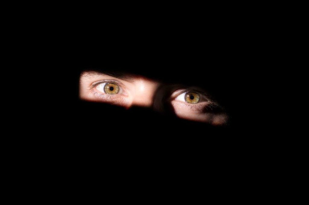 look-out-dark-eyes-black-background (1)