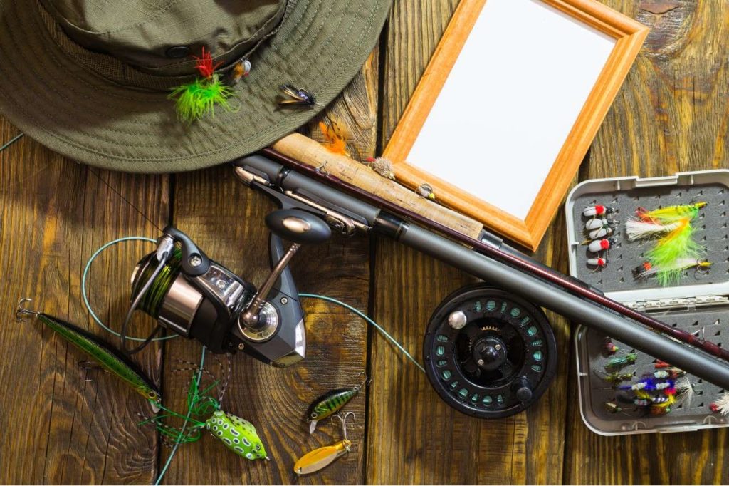 spinning-fly-fishing-flies-spinners-hat-frame-your-label-lying-wooden-table (1)