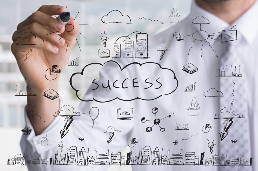 businessman-drawing-keys-success-2