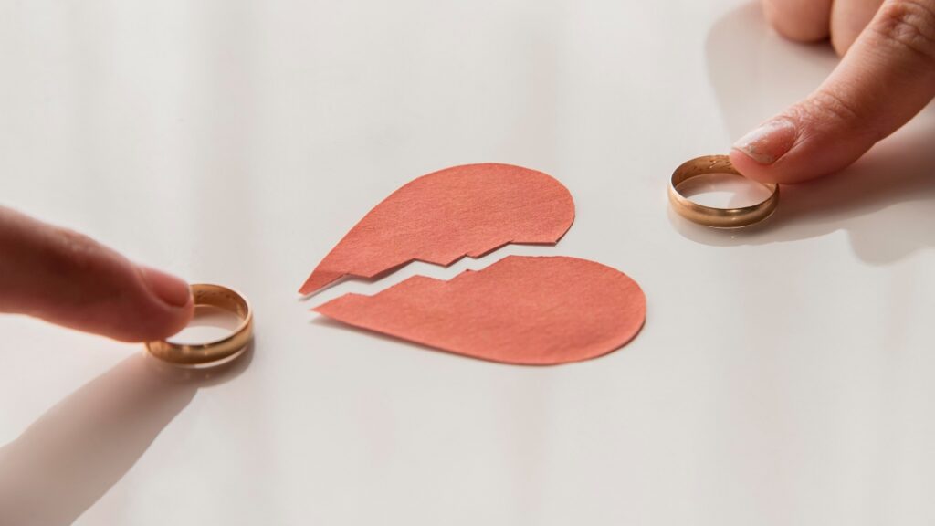 diazugio high-angle-hands-touching-wedding-rings
