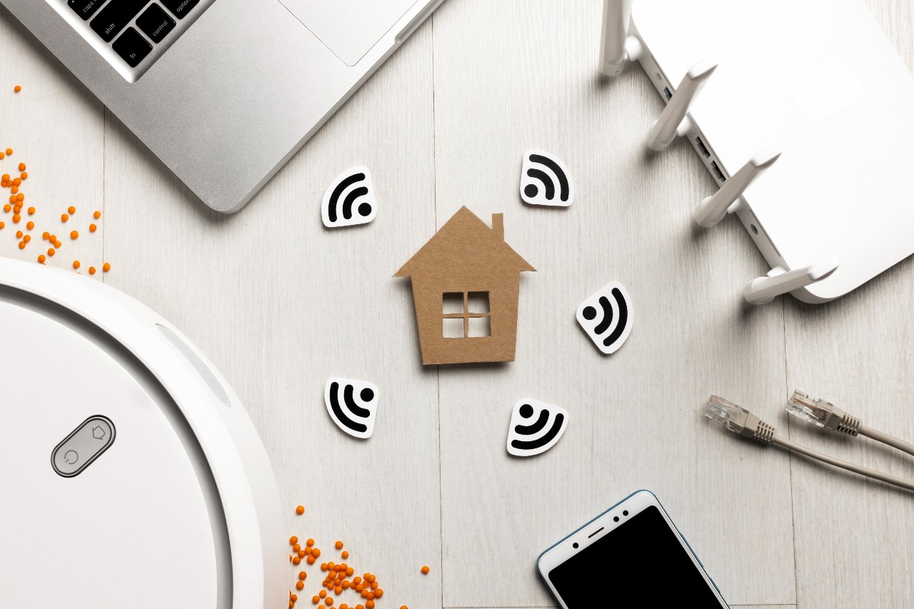 top-view-wi-fi-router-with-house-figurine-wireless-controlled-devices