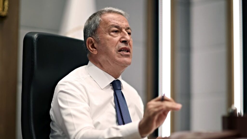 Χουλουσί Ακάρ.