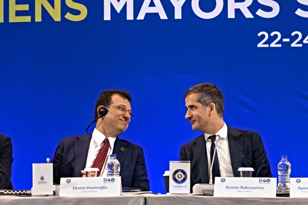 Εκρέμ Ιμάμογλου, Κώστας Μπακογιάννης.
