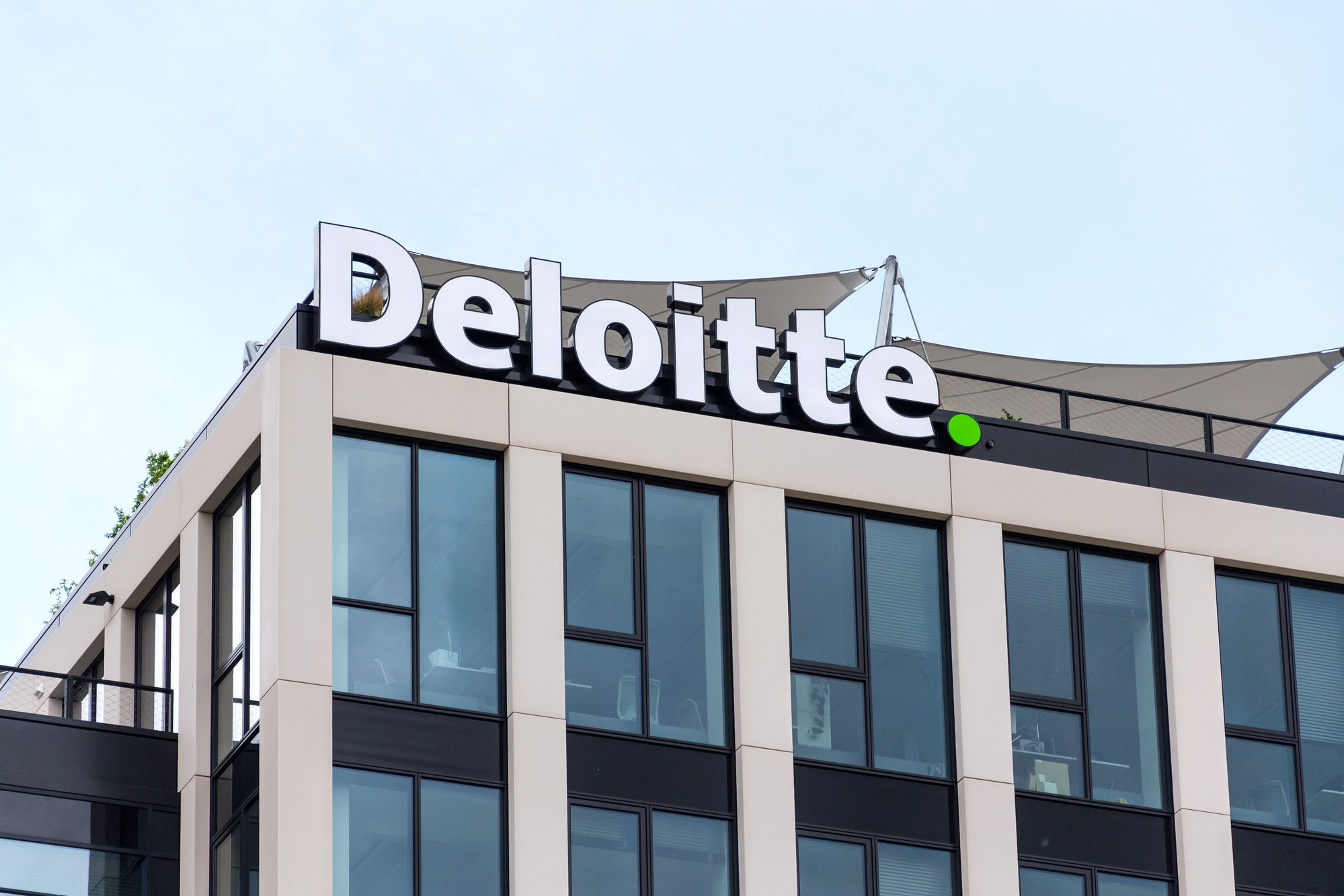 PRAGUE, CZECH REPUBLIC – APRIL 30 2020: Deloitte professional service company network logo on the building of the Czech headquarters on April 30, 2020 in Prague, Czech Republic.