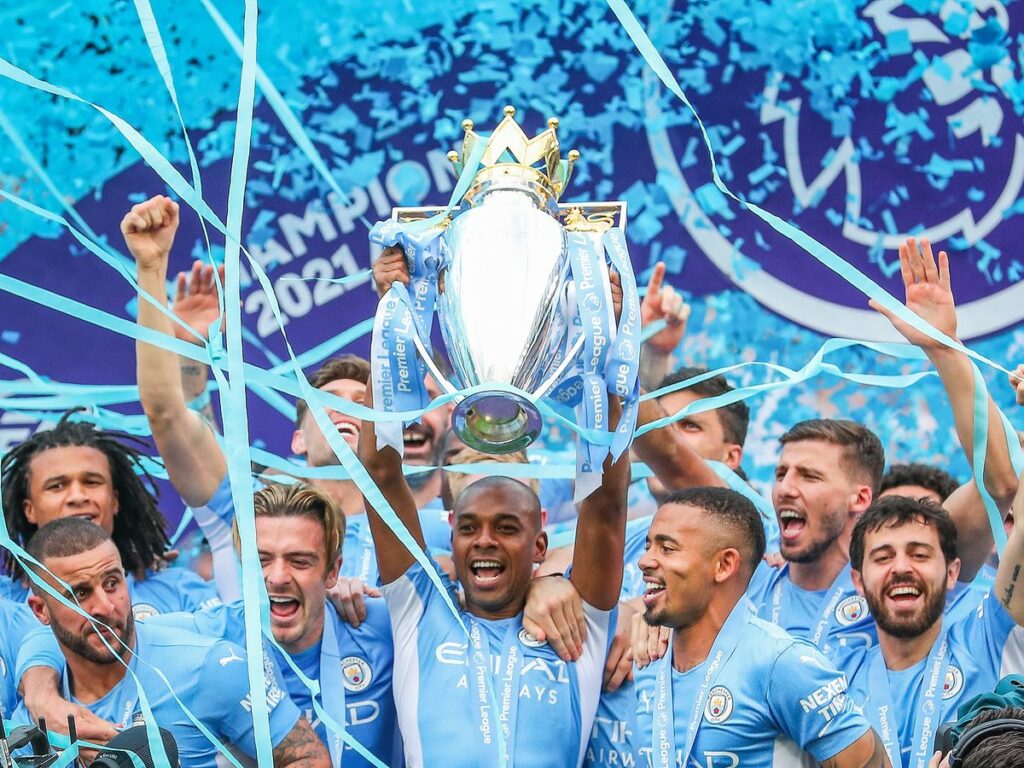 230328133719_premier-league-manchester-city-players-celebrate-1658319078
