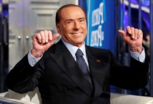 FILE PHOTO: Italy’s former Prime Minister Silvio Berlusconi gestures during the taping of the television talk show “Porta a Porta” (Door to Door) in Rome