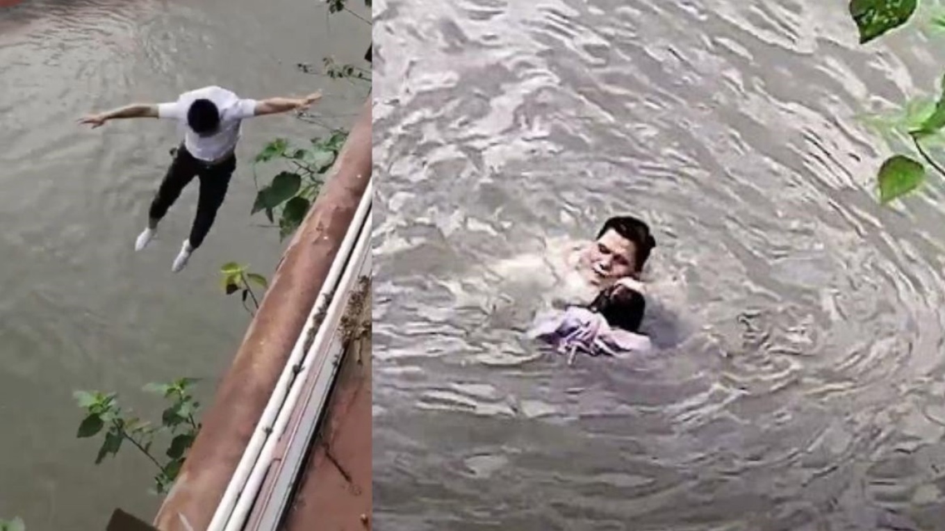 Κίνα: Άνδρας πηδάει από γέφυρα για να σώσει κορίτσι από βέβαιο πνιγμό - Βίντεο