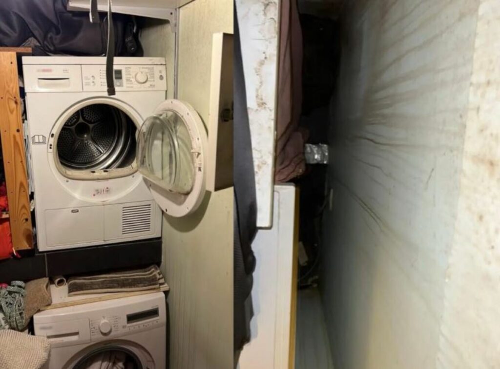 Φυγόποινη κρυβόταν πίσω από το πλυντήριο για να μην συλληφθεί (ΒΙΝΤΕΟ)