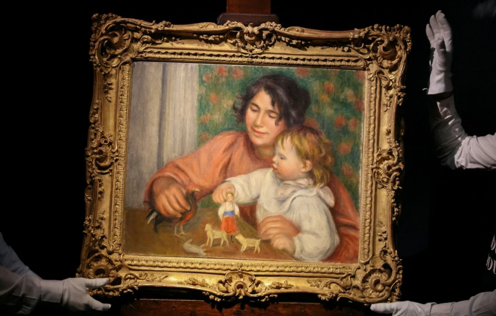 251126154659_1444x920_this-photograph-shows-an-exclusive-presentation-of-an-oil-painting-on-canvas-before-1910-entitled-the-child-and-his-toys-gabrielle-and-the-artist-s-son-jean-a-major-piece-of-art-by-pierre-auguste-renoir-1